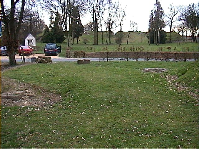 Car park with theatre behind.